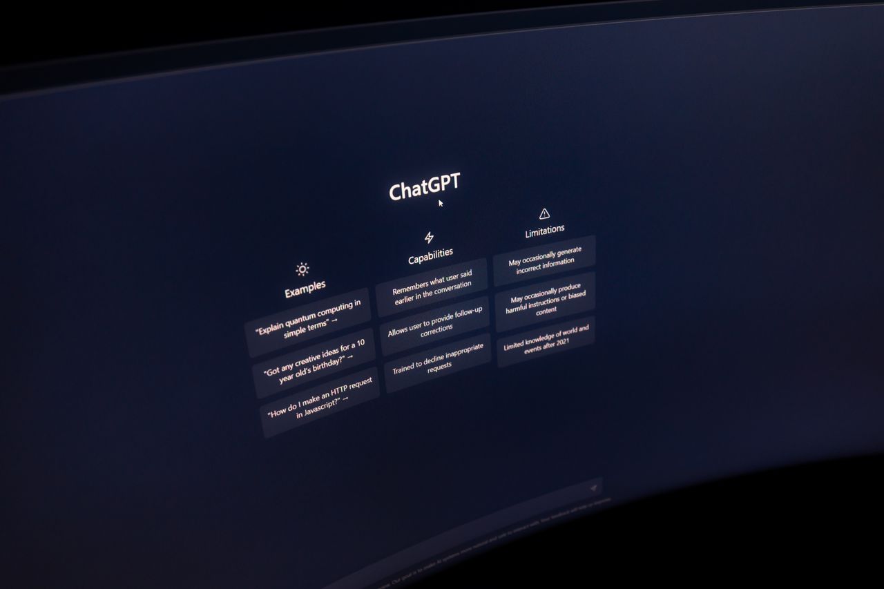 team-02 Close-up of a computer screen displaying ChatGPT interface in a dark setting.